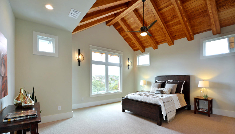 Bedroom with vaulted ceiling